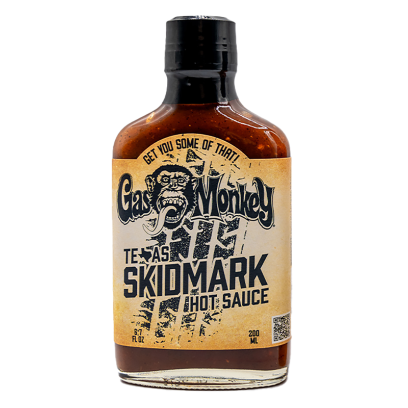 Front view of GMG Texas Skidmark Hot Sauce bottle showcasing the Texas Skidmark label on a white background