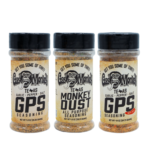 Front view of three Gas Monkey seasoning jars showing GPS and Monkey Dust labels on a black background