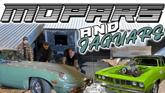 Three men inspect a teal Jaguar and bright green Mopar muscle car outdoors