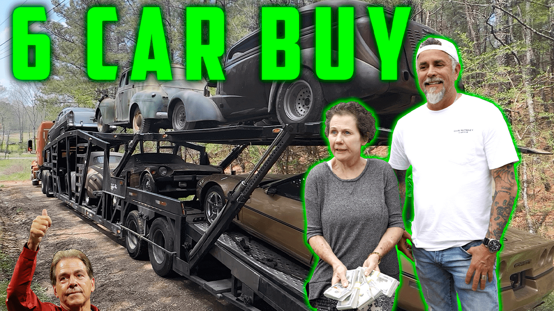 Three adults stand beside a transporter loaded with classic cars on a wooded road beneath the headline 6 CAR BUY
