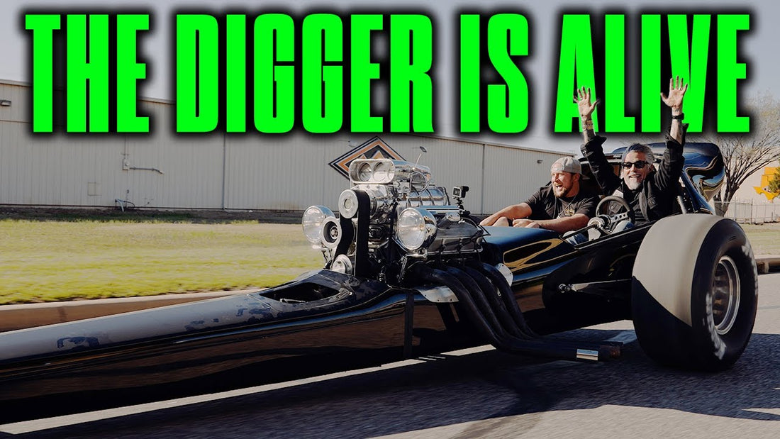 Two men drive the street-legal Digger dragster on a road beside a building, with headline text The Digger Is Alive