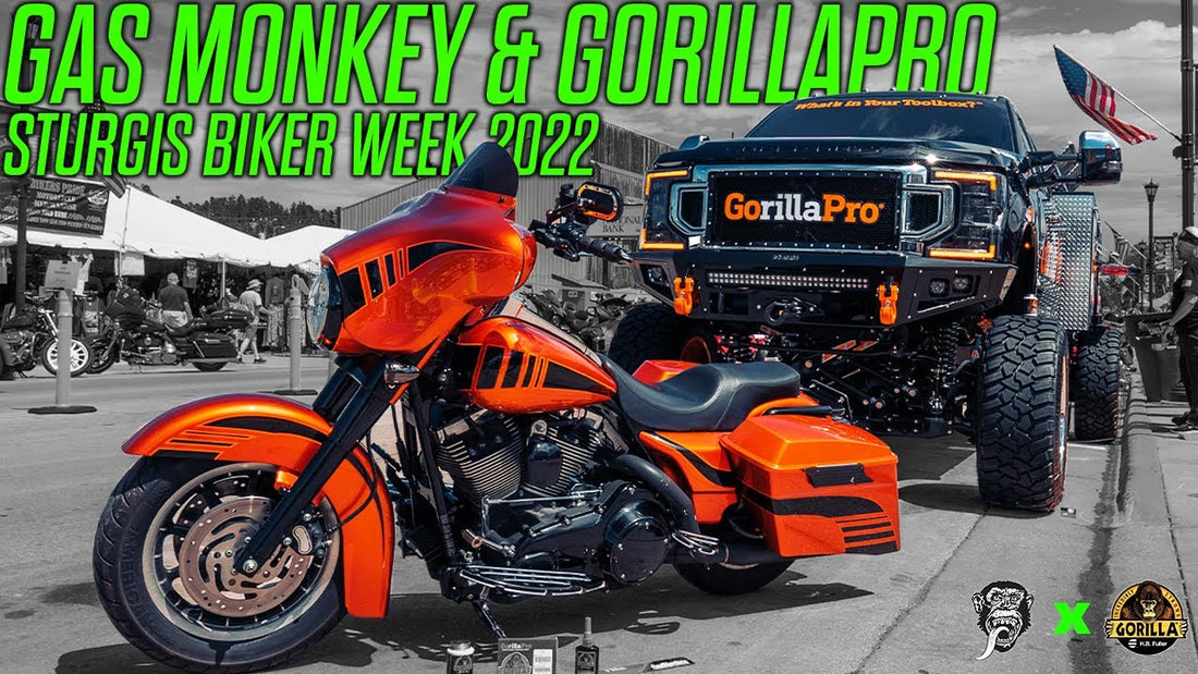 Orange touring motorcycle beside a black GorillaPro truck with Gas Monkey and GorillaPro Sturgis Biker Week 2022 headline