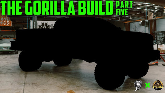 Side view of GorillaPro Ultimate Service Truck covered in a garage, with The Gorilla Build Part Five