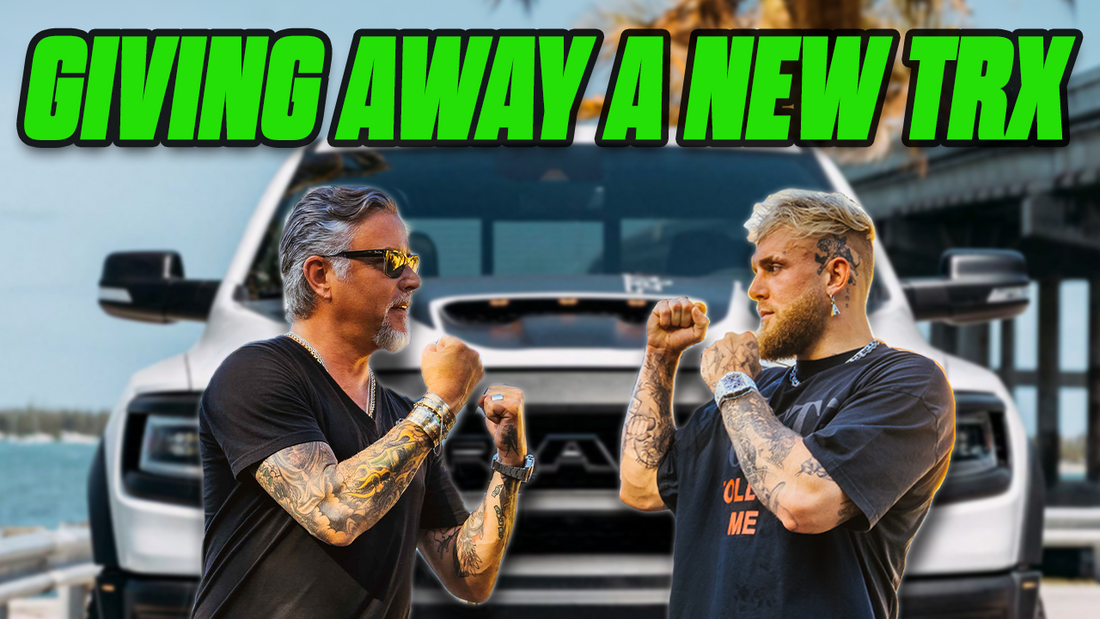 Jake Paul and Richard pose with raised fists in front of a white TRX under the headline Giving away a new TRX