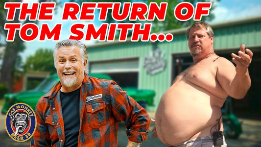 Tom Smith and Richard stand outside Gas Monkey Garage, with Tom in a plaid shirt and Richard shirtless