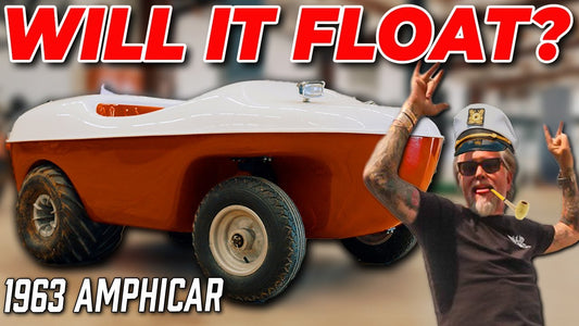 Side view of a 1963 Pengor Penguin amphibious car with orange and white body, four wheels, and Will It Float headline