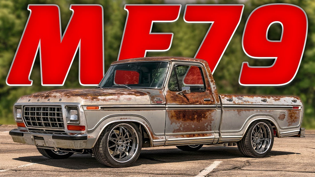 Front three-quarter view of a 1979 Ford F100 showcasing its patina finish and polished wheels with MF79 lettering behind it
