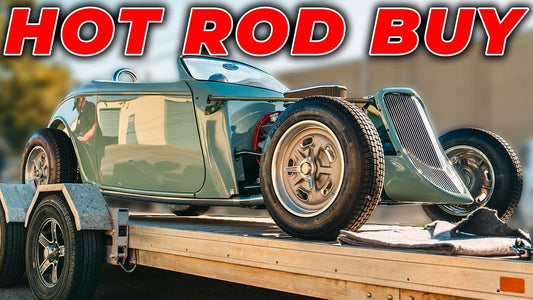 Hot rod on a trailer with HOT ROD BUY headline
