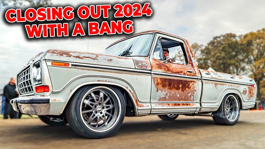 Rear three-quarter view of a weathered pickup truck showcasing rusted patina and custom wheels with text reading Closing Out 2024 With a Bang