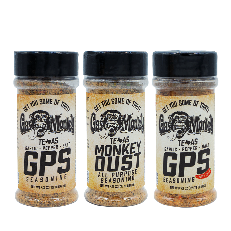 Front view of three Gas Monkey seasoning jars showing GPS and Monkey Dust labels on a black background