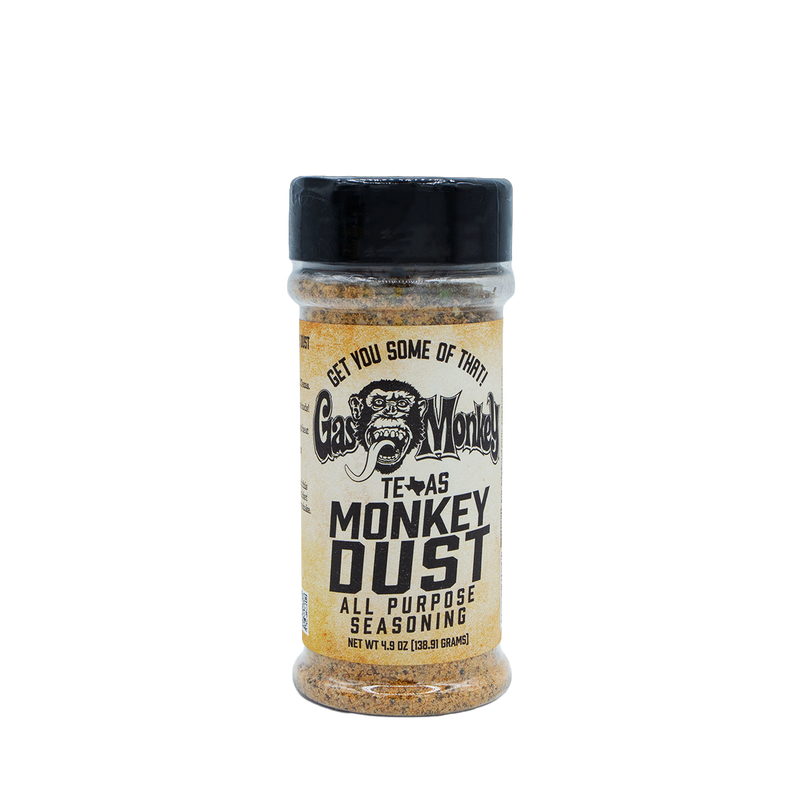 Front view of GMG Monkey Dust Seasoning 4.9oz bottle with Texas Monkey Dust all-purpose seasoning label on black background